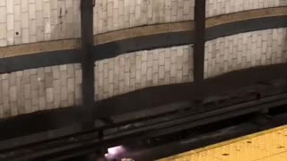 Putting out fire on subway tracks