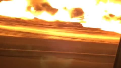 Train Derailment Fire Blazes in the Night