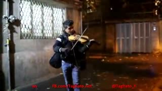 Talented Iranian boy playing violin in the streets of Tehran