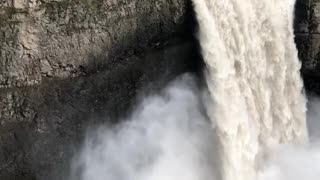 Melting Spring Snow Unleashes Powerful Waterfall