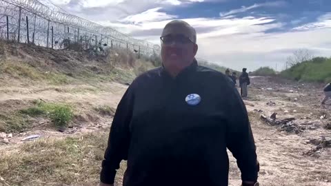 Migrants mark Good Friday at Texas' razor wire border