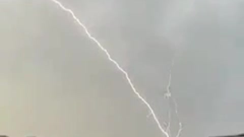 Rising lightning strike over Mount Shada (Saudi Arabia, 09/12/2021).