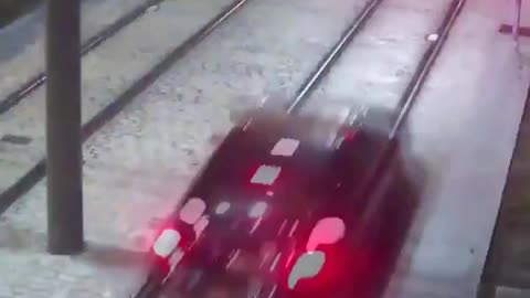 A car has been filmed being driven along train tracks in Malaga by a drunk driver