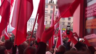 Polish national anthem sung by thousands celebrating 100 yrs of independence
