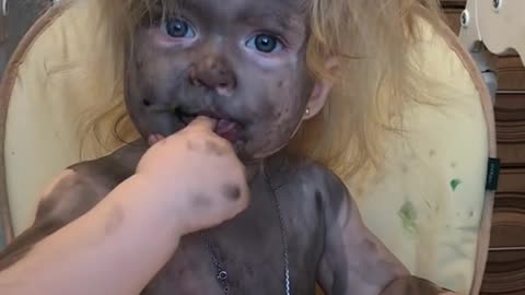 Child Covered in Paint