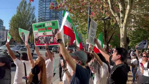 Protestors in Vancouver sing along to Iranian pro-freedom song.