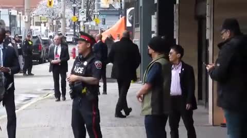 Justin Trudeau is forced to scuttle around surrounded by security in Hamilton today