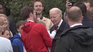 "Biden sniffs a baby"