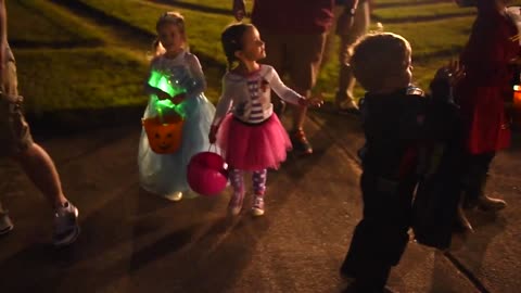 Children Have a Blast Trick-or-Treating on Spooky Halloween Night