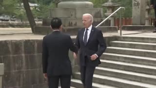 Bumbling Joe Biden Comes Close To Falling As He Walks Down The Stairs