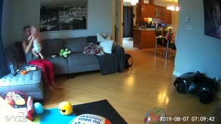 Dad Reflexes Kick in When Baby Tumbles off Couch