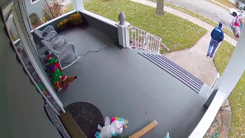 Postman Throws Package on Porch and Knocking Over Unicorn Christmas Decoration