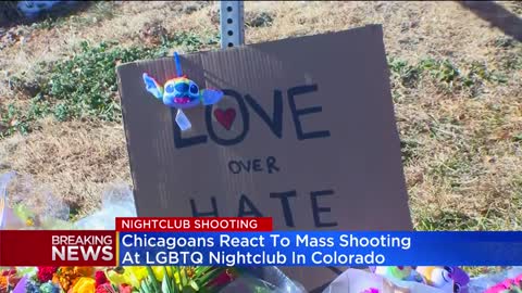 Chicagoans hold vigil for victims of mass shooting at LGBTQ night club in Colorado