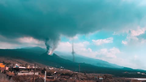 Active Volcano Recorded From Nearby Hill as It Erupts Causing Smoke to Rise