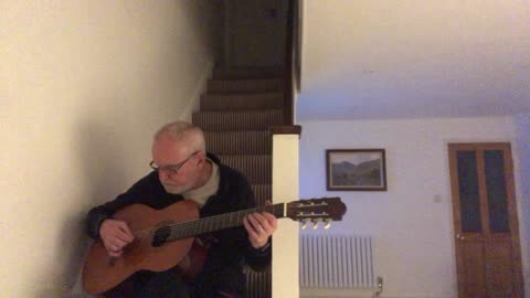 Playing a classical guitar with a reesha or oud pick 3