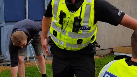 Police in Scotland Enjoy a Slip and Slide