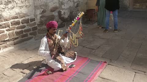 Indian Street Musician Playing his Ravanahatha, Rajasthan, India