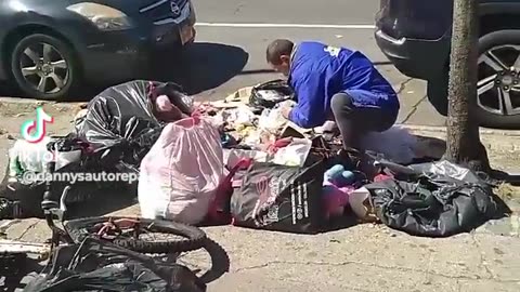 NYC Migrants are now literally eating Garbage