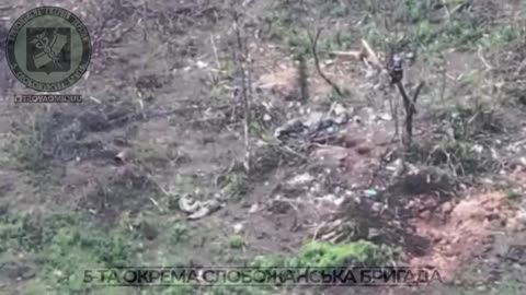 Ukrainian soldier defends his foxhole against Russian soldiers