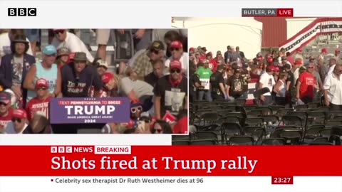 Moment Donald Trump was rushed off stage after shots fired at rally | BBC News