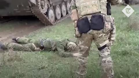 While fighting continues in Kherson, Russian soldiers are handed over to Ukrainian forces.