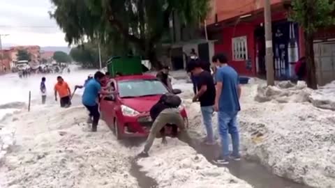 Heavy hail leaves Bolivian town covered in white