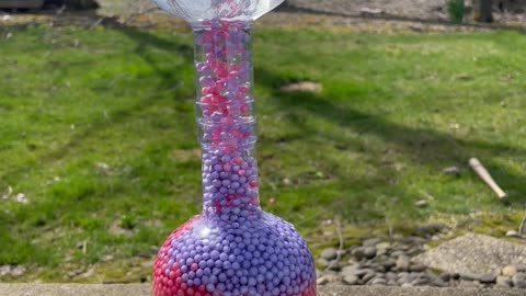 Moving Beads in Glass Bottles