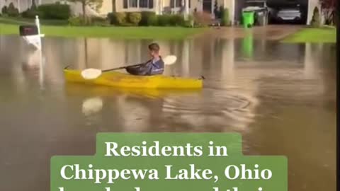 Residents in Chippewa Lake, Ohio kayaked around theirneighborhood after