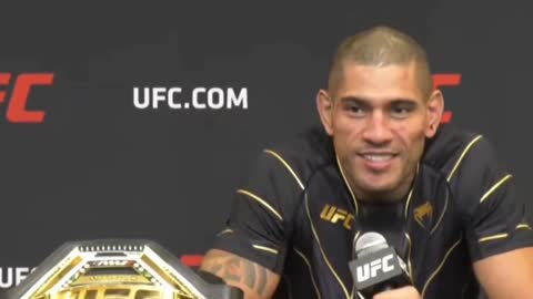 Alex Pereira reacts after beating Israel Adesanya at UFC 281