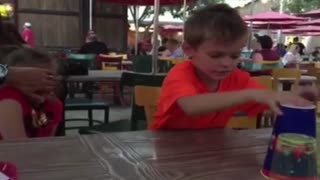 Kid Fails At Classic Cup Trick