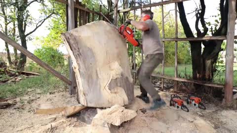 AMAZING CHAINSAW wood carving, Native American with wolves