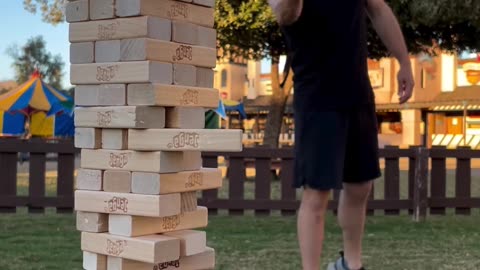 Man Skillfully Plays Jenga With a Whip