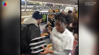 NYC subway passengers serve full Thanksgiving meal during commute