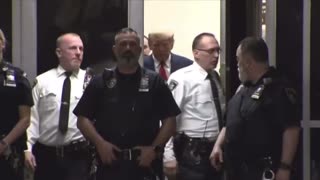 President Trump enters the courtroom.