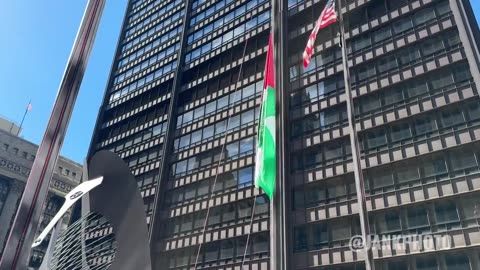 Palestinian flag raised above the American flag at Daley Plaza in Chicago