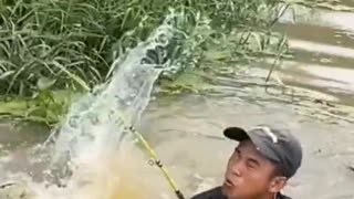 the pull of this monster fish makes me fall