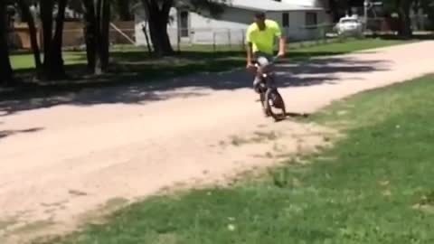 Guy tries to do a spin on his bike and gets a face full of dirt