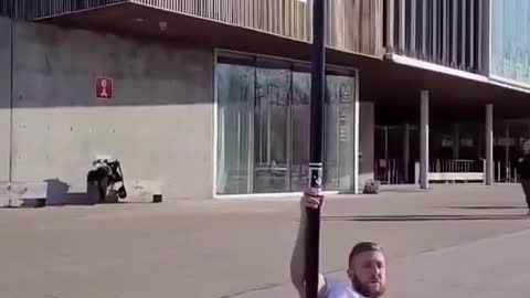 Athlete Adds Reverse Motion SFX to Calisthenics Clutch Lever Trick While Sliding Down Pole