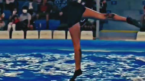 Unbelievable: A Girl with Incredible Skills Performs Tricks with a Highly Trained Dolphin
