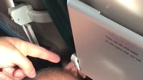 Baby Pulls at Leg Hairs on Plane
