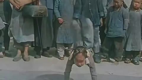 An amazing child acrobat in China, 1917