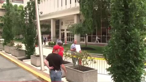 Protesters outside of the courthouse after the Hunter guilty verdict are yelling at the press