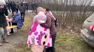 Mother reunites with children at Ukraine border