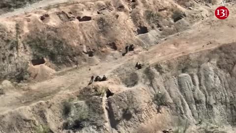 Russians try to rescue surrounded wounded comrades