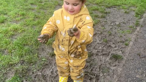 Toddler Puts Mud On Head