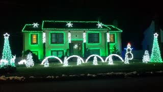 Festive decorations dazzle neighborhood with Christmas light display