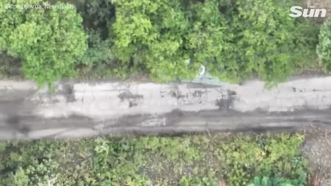 Ukrainian drone drops bombs on Russian troops and vehicles
