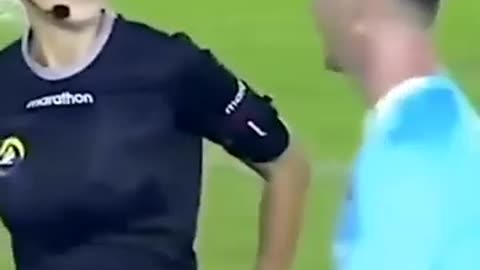 The beautiful and funny soccer referee was joking.