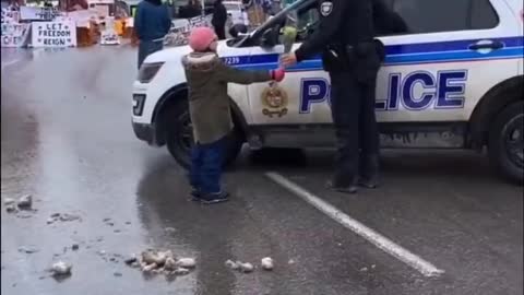 Little Girl Reminds Canadian Police Officer Never To Forget His Humanity