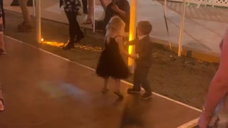 Heart melting little boy and girl dance at a wedding